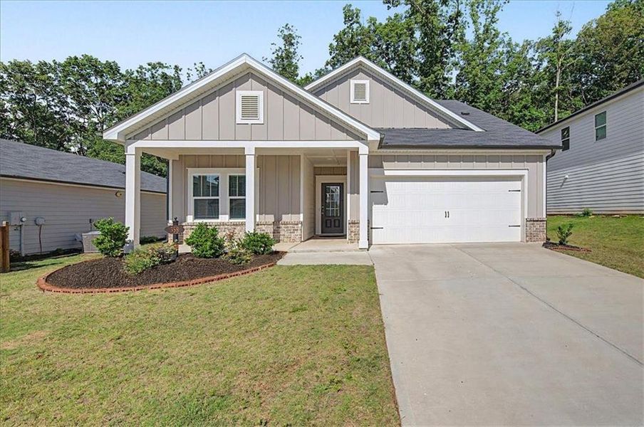 Front exterior of a new home in , Canton, GA, highlighting curb appeal (Image 2). Front exterior of a new home in , Canton, GA, highlighting curb appeal (Image 2).