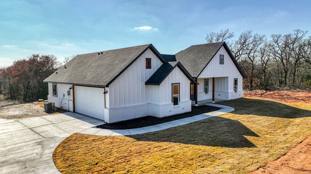 Representative exterior photo of a completed home built from the Loretta by Zeal Home Builders in Horizon Meadow Estates, Paradise, TX (Image 34). Representative exterior photo of a completed home built from the Loretta by Zeal Home Builders in Horizon Meadow Estates, Paradise, TX (Image 34).