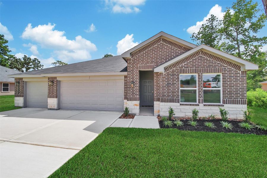Front exterior of a new home in Williams Reserve East, Conroe, TX, highlighting curb appeal (Image 17).