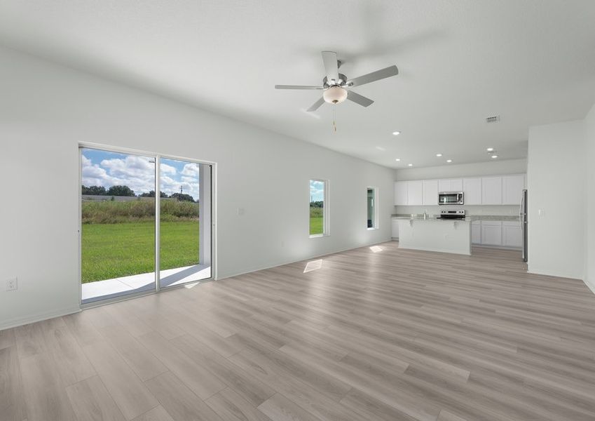 Family room with a sliding door that leads to the back yard