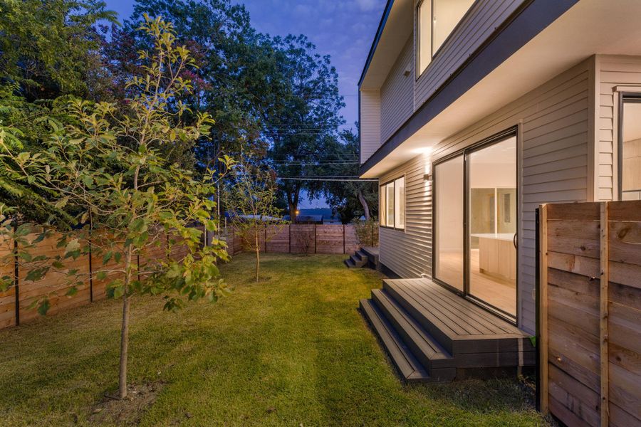 View of fenced backyard