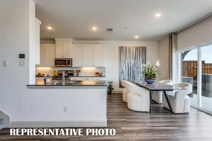 Entertaining is a breeze in this wonderful open concept floor plan. REPRESENTATIVE PHOTO Entertaining is a breeze in this wonderful open concept floor plan. REPRESENTATIVE PHOTO
