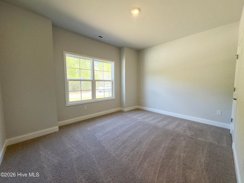 Spacious, unfurnished interior of a new home in East Lake, Leland (Image 20).