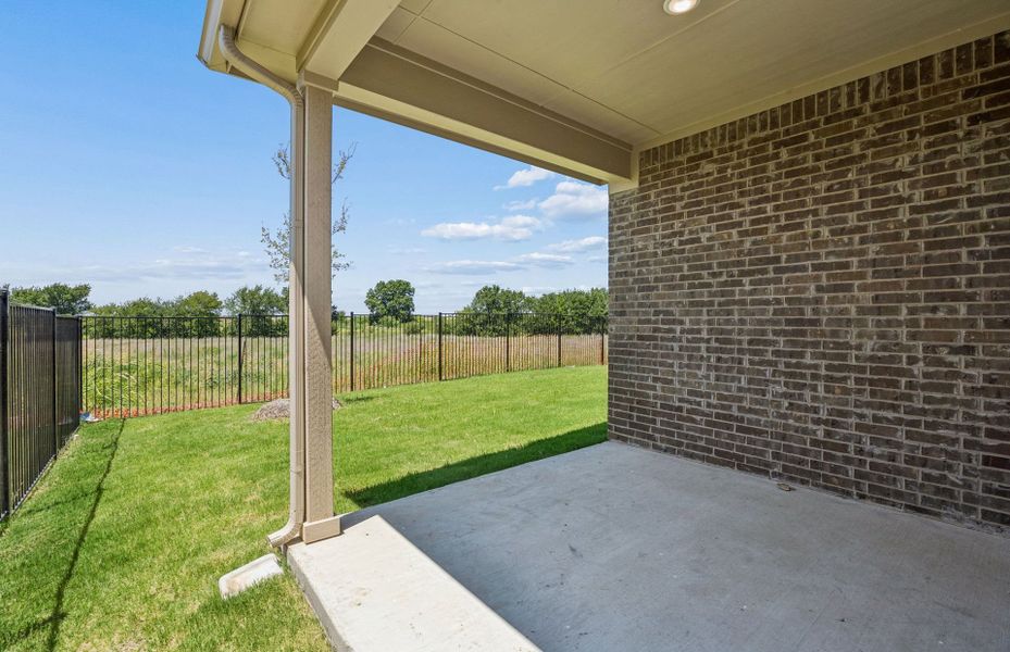 Exterior details and patio area of a home in Creekview Meadows, Pilot Point (Image 3). Exterior details and patio area of a home in Creekview Meadows, Pilot Point (Image 3).
