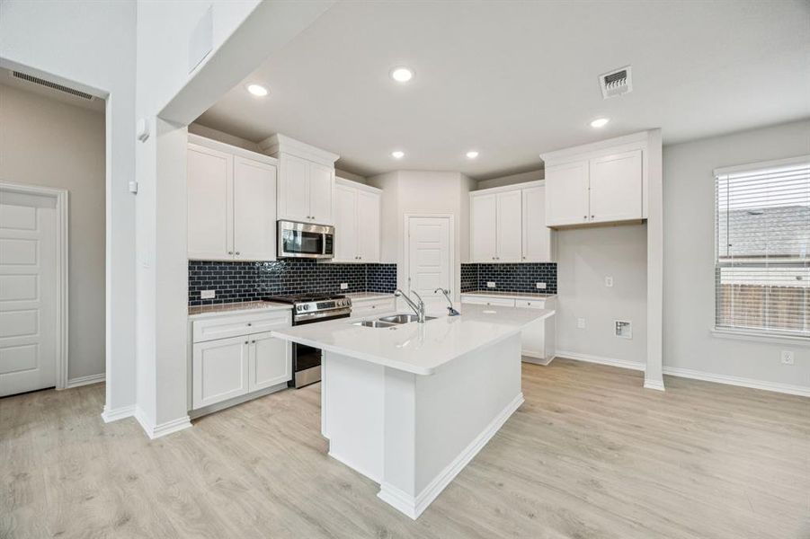 Furnished interior view inside a new home in Bel Air Village, Sherman (Image 7). Furnished interior view inside a new home in Bel Air Village, Sherman (Image 7).