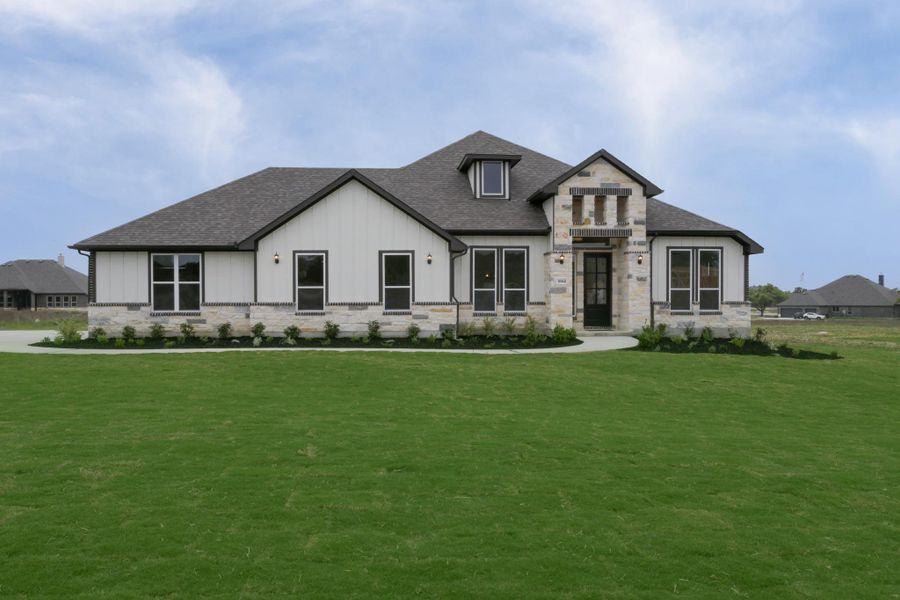 Representative exterior photo of a completed home built from the Avalon II by Ashton Woods in Waldsanger, New Braunfels, TX (Image 1). Representative exterior photo of a completed home built from the Avalon II by Ashton Woods in Waldsanger, New Braunfels, TX (Image 1).