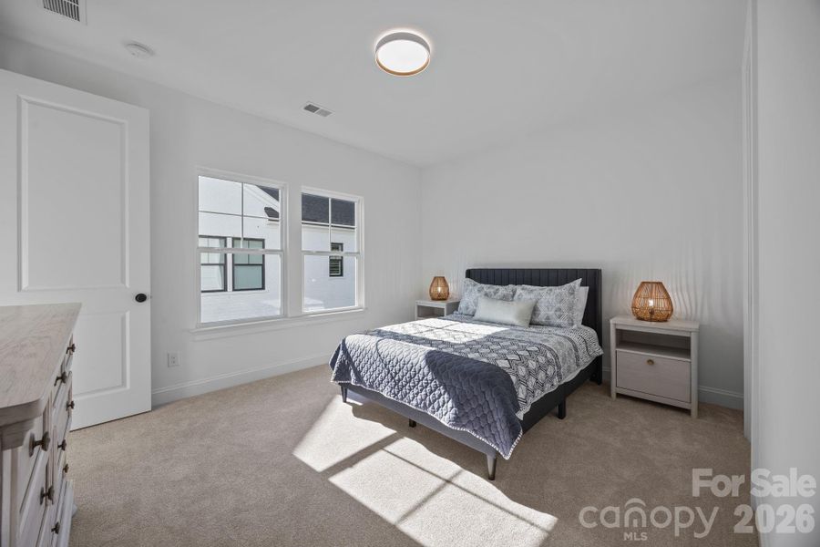 Upstairs bedroom with en-suite bath