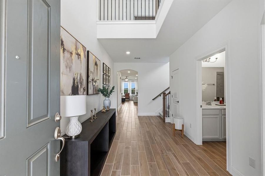 Furnished interior view inside a new home in West Cypress Hills, Spicewood (Image 23).