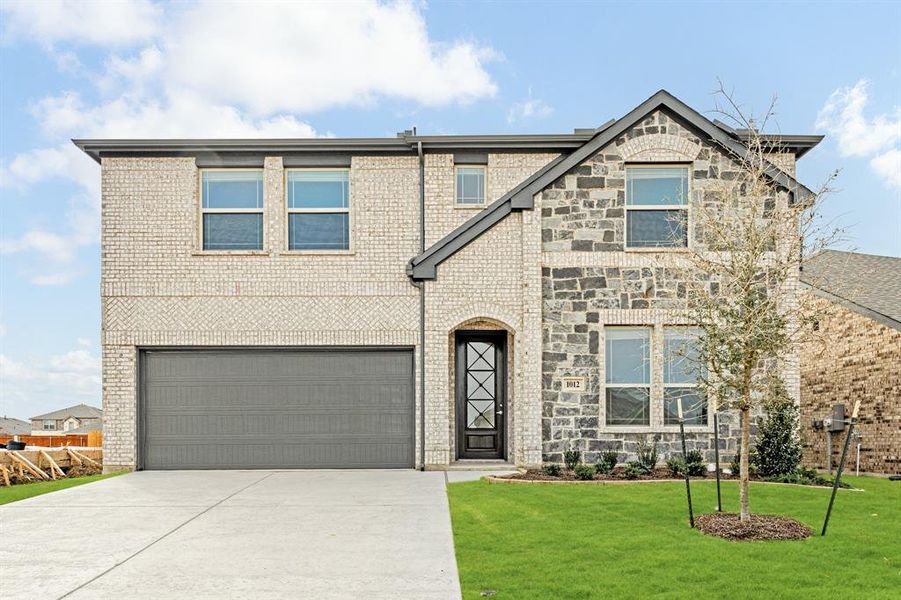 Front exterior of a new home in Eagle Glen Elements, Alvarado, TX, highlighting curb appeal (Image 20). Front exterior of a new home in Eagle Glen Elements, Alvarado, TX, highlighting curb appeal (Image 20).