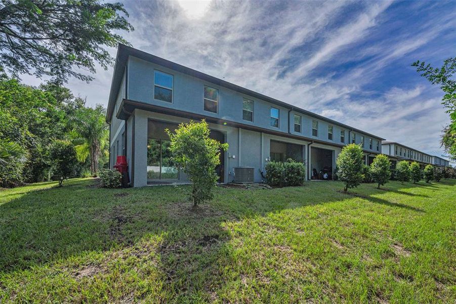 Front exterior of a new home in , Holiday, FL, highlighting curb appeal (Image 26).