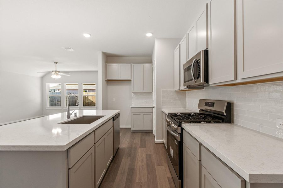 Furnished interior view inside a new home in Sunterra, Katy (Image 5).