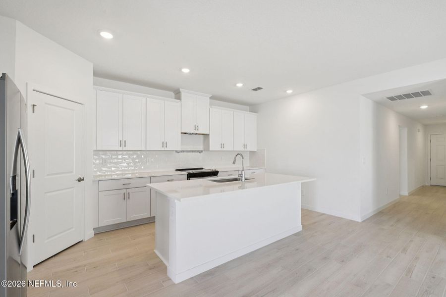 Furnished interior view inside a new home in Colbert Landings, Palm Coast (Image 6).