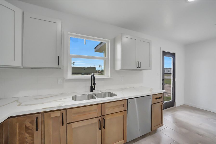 Furnished interior view inside a new home in , Conroe (Image 9).