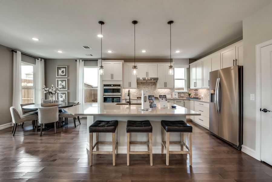 Spacious kitchen with eat-in bartop island