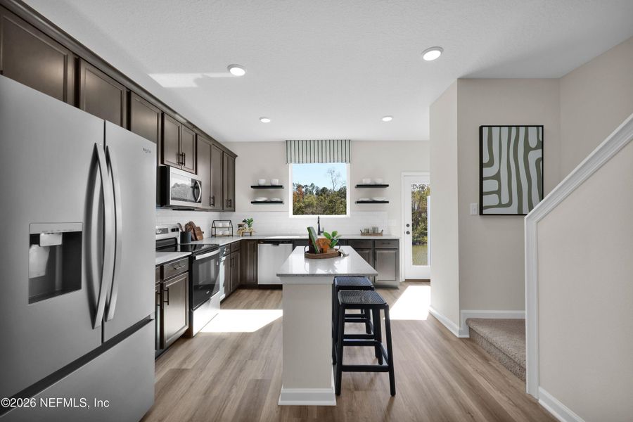 Furnished interior view inside a new home in Baxley Villas, Middleburg (Image 8).