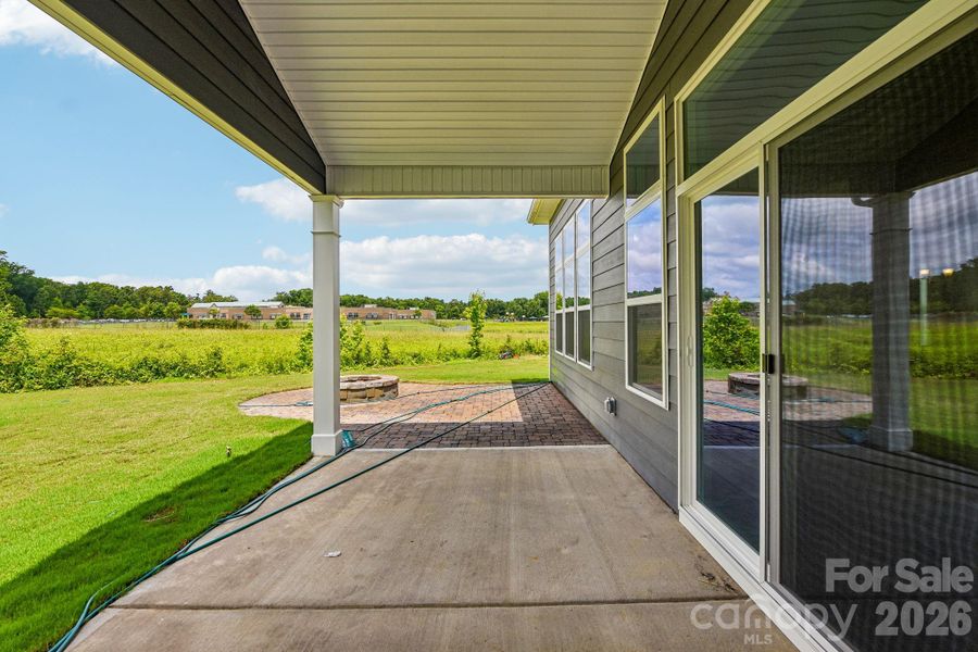 Exterior details and patio area of a home in Sanctuary at Southgate, Indian Trail (Image 4).