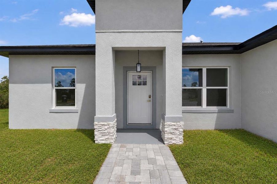 Exterior details and patio area of a home in , Ocala (Image 3).