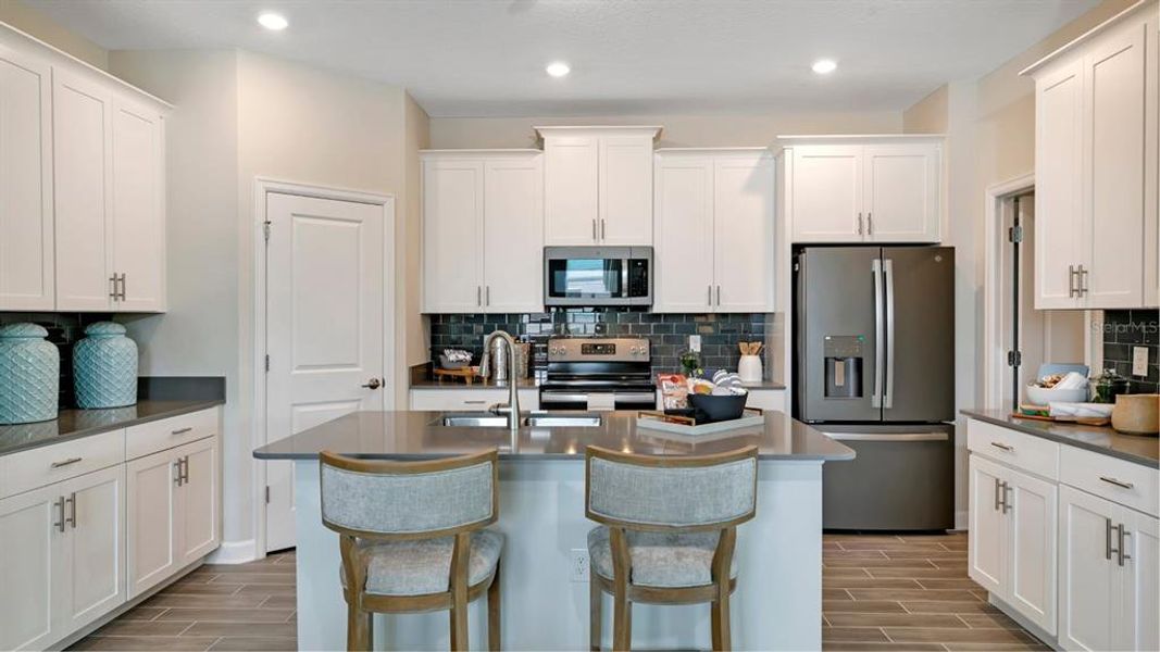 Furnished interior view inside a new home in Bridgewalk, St. Cloud (Image 2). Furnished interior view inside a new home in Bridgewalk, St. Cloud (Image 2).