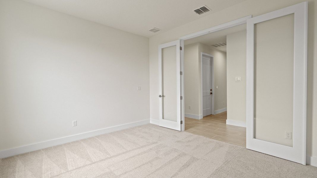 Representative unfurnished interior of a home built from the Longleaf by DRB Homes in Lakeside at Satilla, St. Cloud (Image 32).