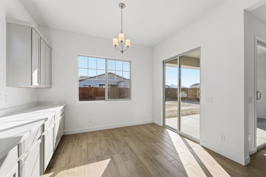 Spacious, unfurnished interior of a new home in Ellsworth Ranch, Queen Creek (Image 30).