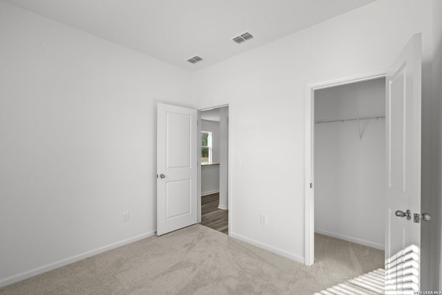 Spacious, unfurnished interior of a new home in Sutton Farms, San Antonio (Image 22).