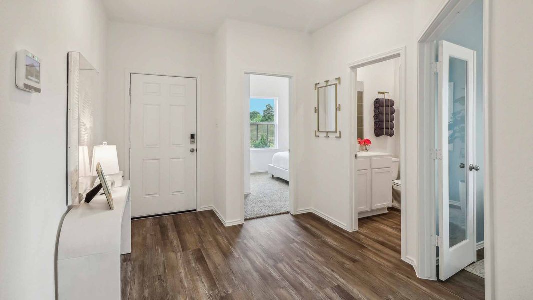 Furnished interior view inside a new home in Sunterra, Katy (Image 17).