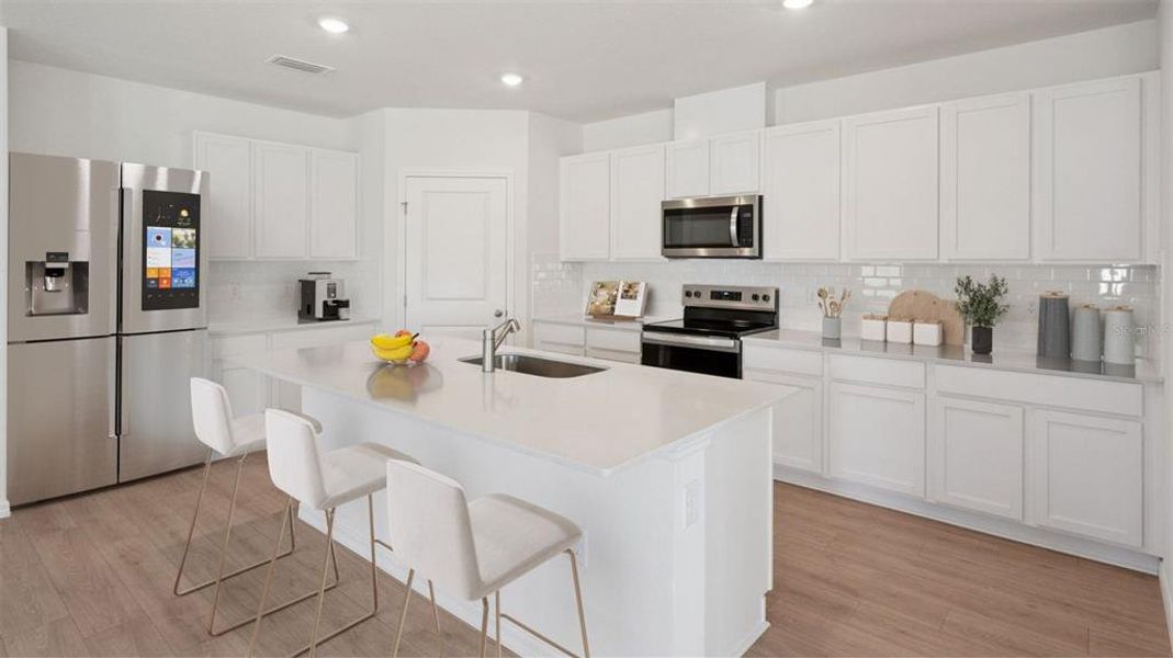 Furnished interior view inside a new home in Harmony West, St. Cloud (Image 2).