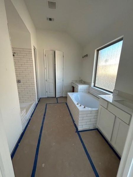 Primary Bath with dual vanities, garden tub & walk-in shower Primary Bath with dual vanities, garden tub & walk-in shower
