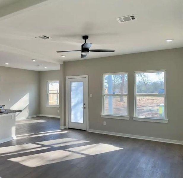 Living Area looking to Kitchen and Breakfast Area, very open