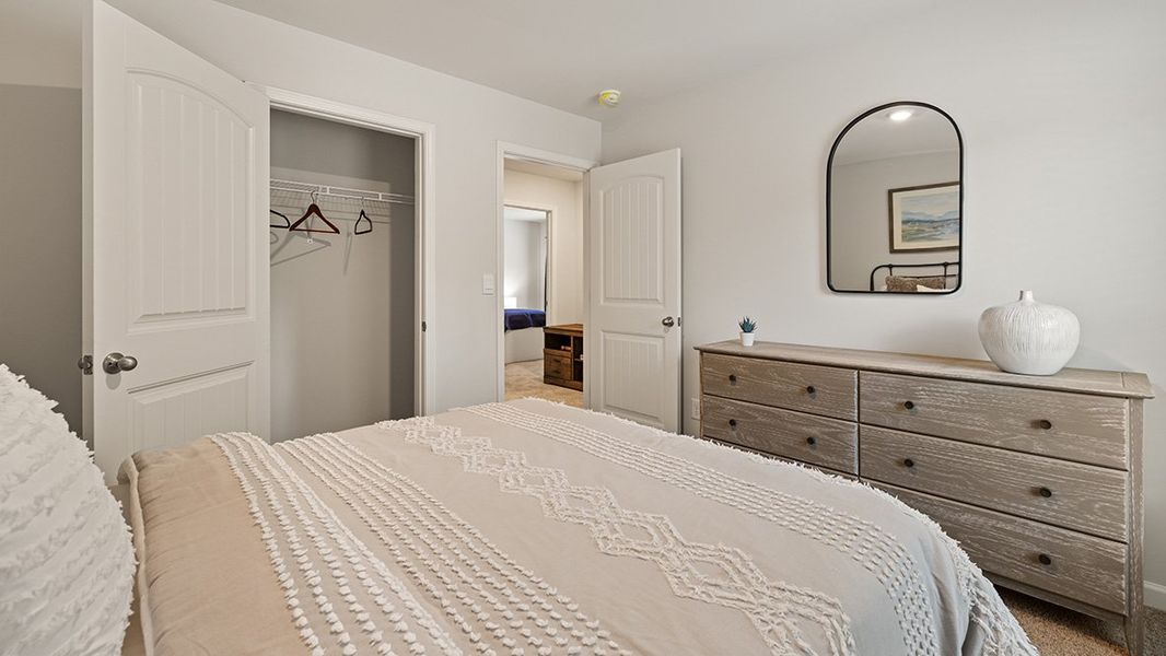 Representative furnished interior of a home built from the ROBIE by D.R. Horton in Pointe Park, Union City (Image 40).