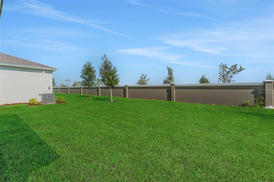 Exterior details and patio area of a home in Seaire, Parrish (Image 26).