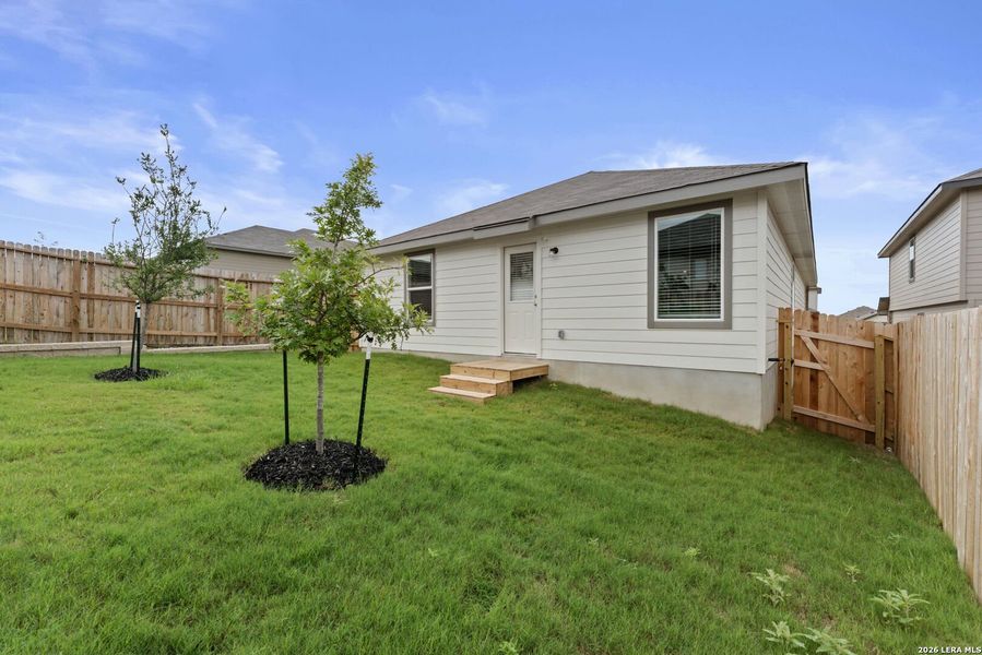 Exterior details and patio area of a home in Stonehill, San Antonio (Image 2).