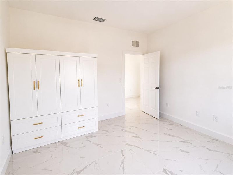 Spacious, unfurnished interior of a new home in , Cape Coral (Image 11). Spacious, unfurnished interior of a new home in , Cape Coral (Image 11).