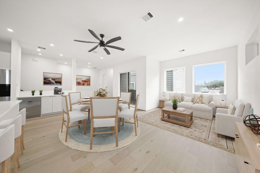 Flowing seamlessly from the family room to the dining room, this bright and inviting area is perfectly suited for casual dinners or more formal gatherings and offers a Butler's Pantry with room for beverage refrigerator. Its location keeps it effortlessly connected to both the kitchen and living area. his photo has been virtually staged.