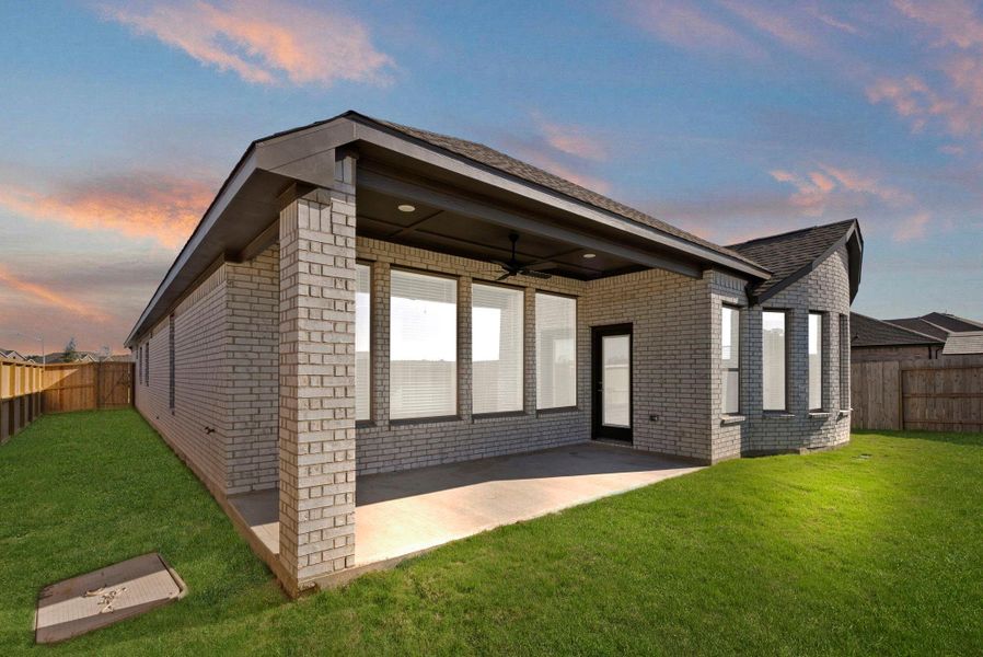 Exterior details and patio area of a home in The Trails 50', New Caney (Image 3).