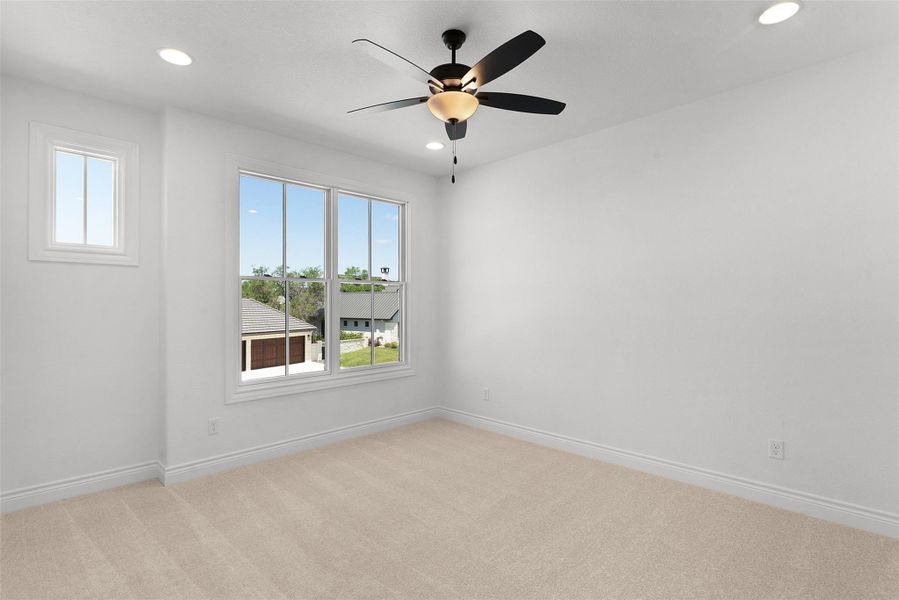 A well-lit chamber with soft carpeting provides a serene and inviting private retreat.