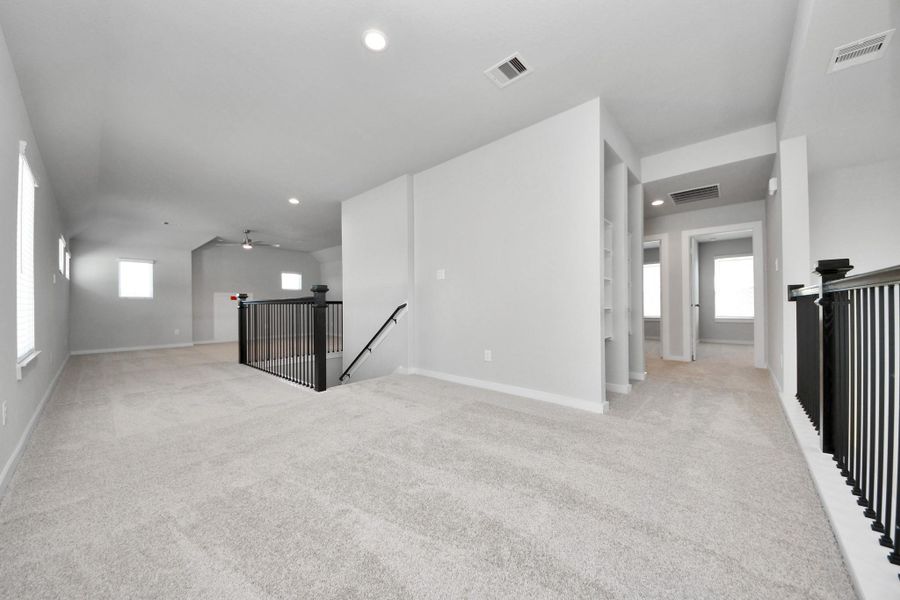 Take another look at the spacious game room area. Sample photo of completed home with similar floor plan. Actual colors and selections may vary. Take another look at the spacious game room area. Sample photo of completed home with similar floor plan. Actual colors and selections may vary.