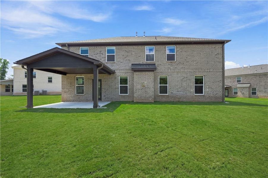 Exterior details and patio area of a home in Westwind Estates, Hampton (Image 4).
