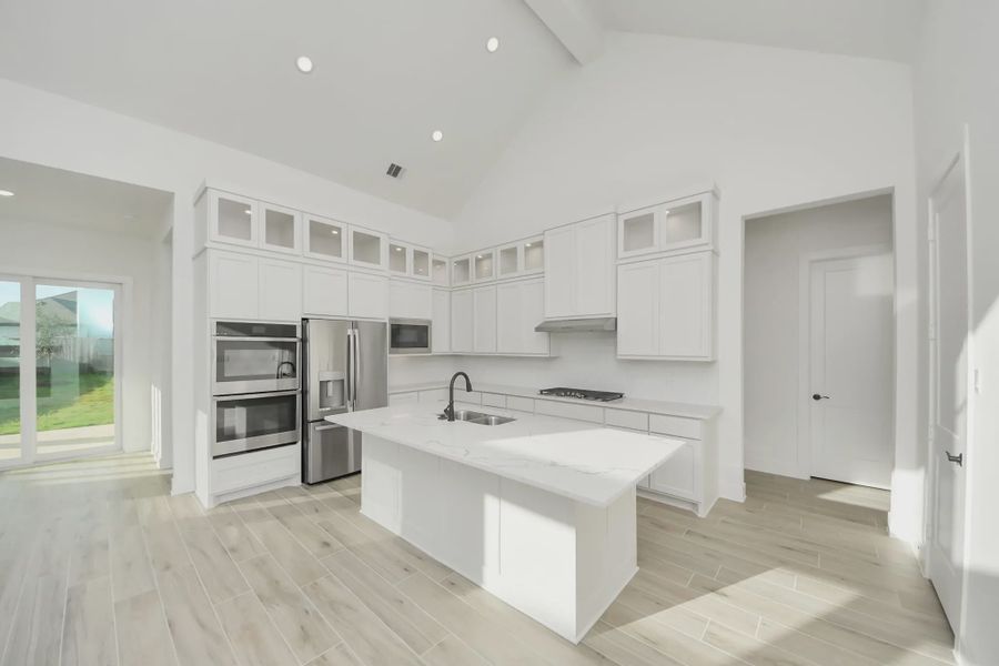 Representative furnished interior of a home built from the Bonneville by Chesmar Homes in Meridiana 50's and 60's, Manvel (Image 9).