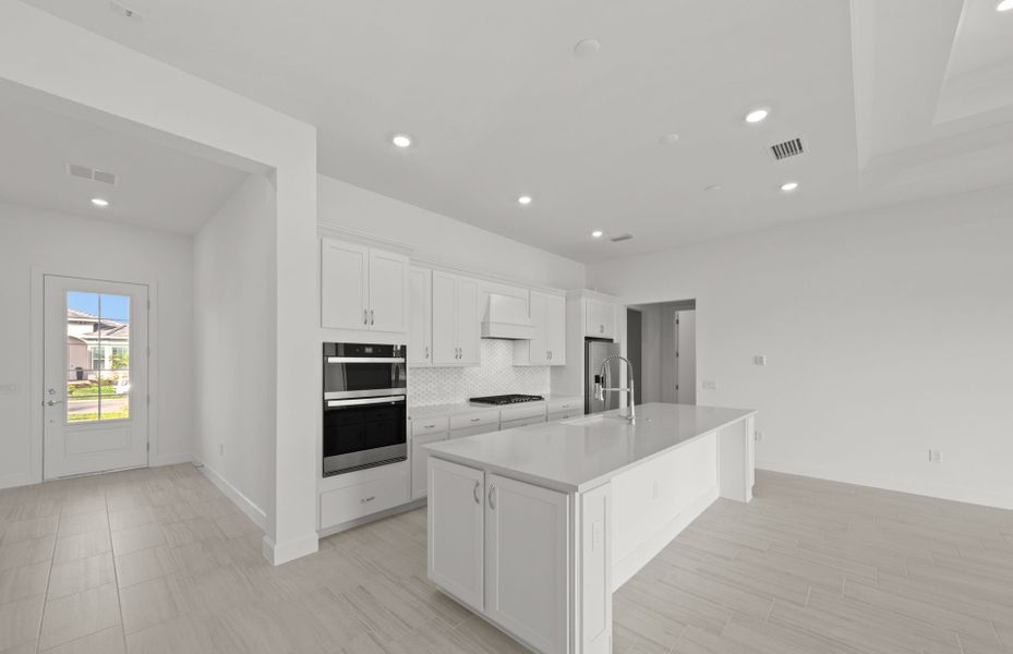 Furnished interior view inside a new home in TerraWalk at Babcock Ranch, Alva (Image 5).