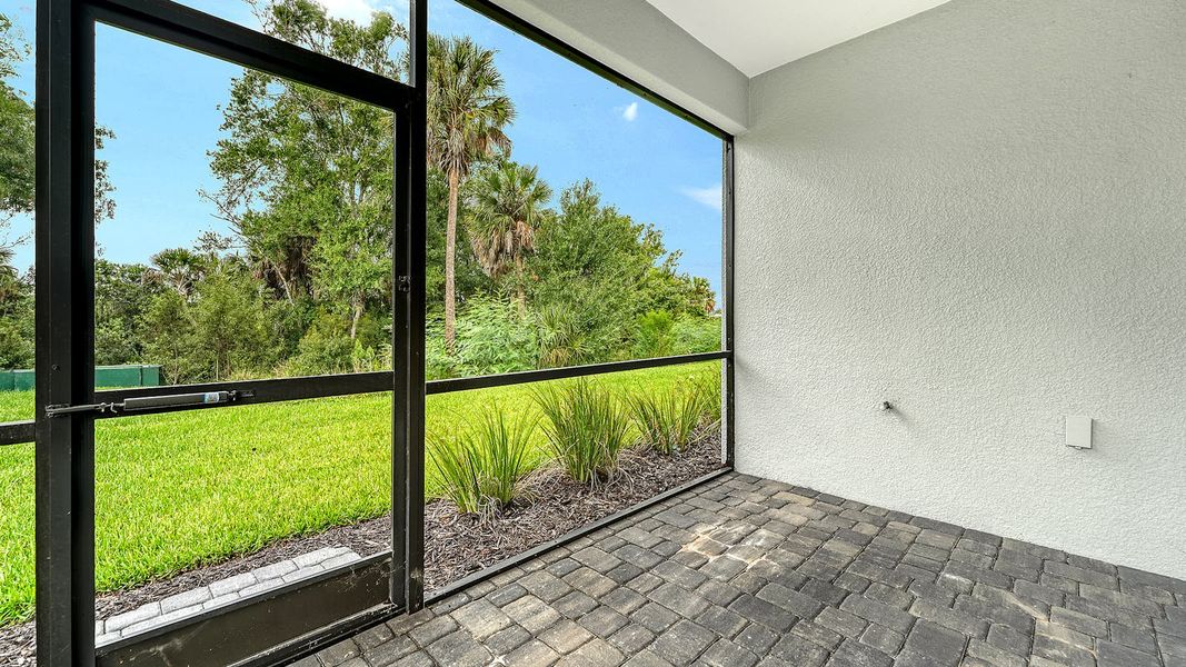 Exterior details and patio area of a home in Wildleaf Real Estate and Homes for Sale in Parrish, FL - Neal Communities, Parrish (Image 20).