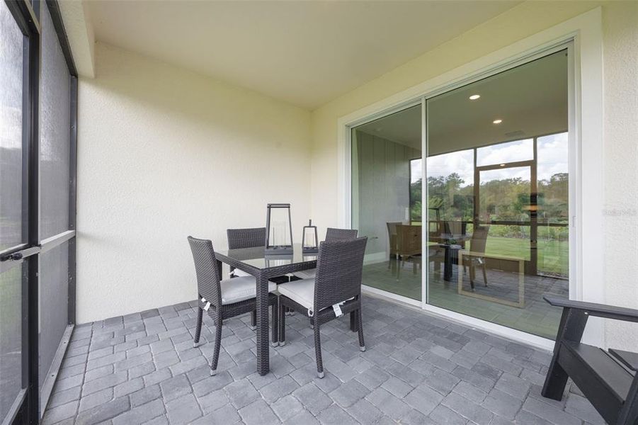 Exterior details and patio area of a home in Lakes of Mount Dora, Mount Dora (Image 3).