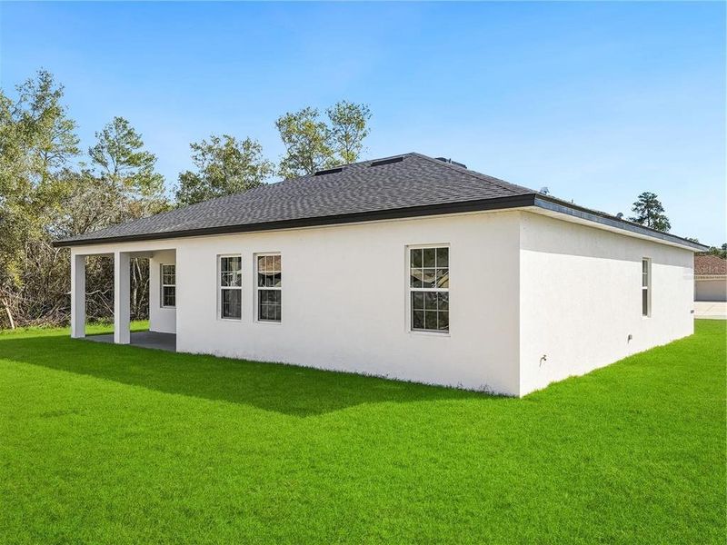 Exterior details and patio area of a home in , Ocala (Image 3).