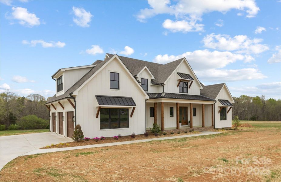 Front exterior of a new home in , Statesville, NC, highlighting curb appeal (Image 25).