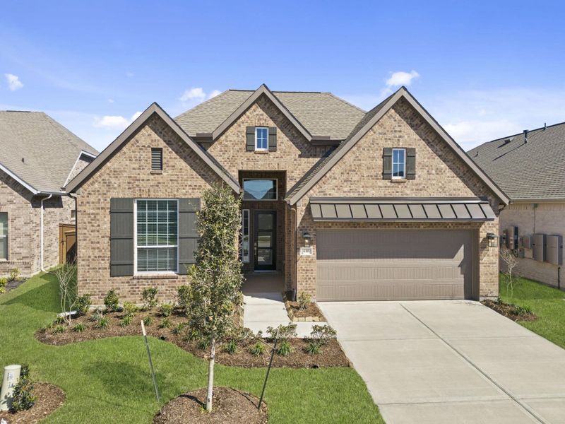 Front exterior of a new home in The Trails, New Caney, TX, highlighting curb appeal (Image 21). Front exterior of a new home in The Trails, New Caney, TX, highlighting curb appeal (Image 21).