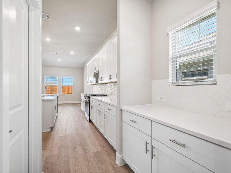 Furnished interior view inside a new home in Lakehaven - Premier Series, Farmersville (Image 9).