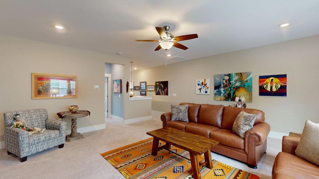 Furnished interior view inside a new home in Summerwind Crossing at Lakes of Cane Bay, Summerville (Image 59).