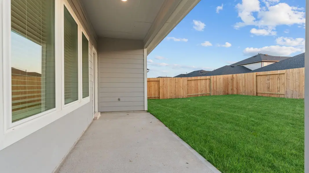 Exterior details and patio area of a home in Tamarron, Fulshear (Image 2).