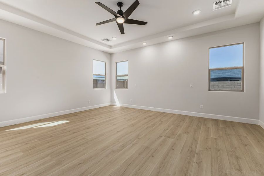 Spacious, unfurnished interior of a new home in Bellero Estates, Queen Creek (Image 17).