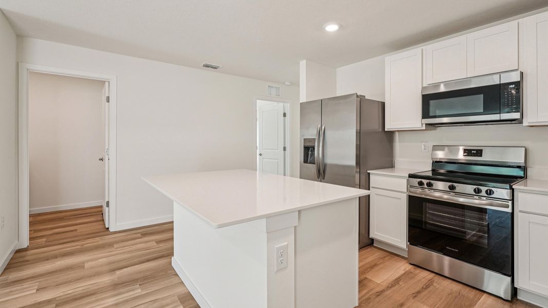 Representative furnished interior of a home built from the Alford by D.R. Horton in Somerset Bay, Spring Hill (Image 15).